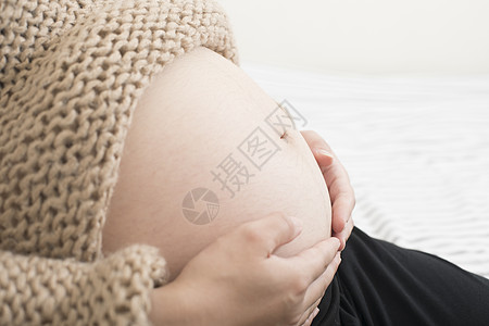 孕妇的肚子特写孕妇照肚子特写背景