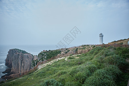 海边灯塔黑白枸杞岛上的自然美景背景