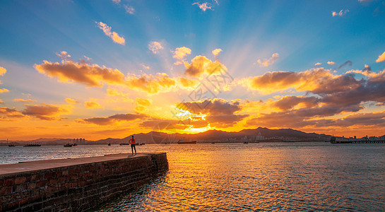 山峰黄昏大海日落背景