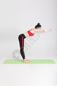 女性健身瑜伽动作棚拍图片