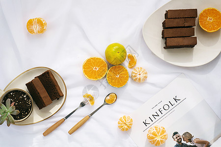橘子蛋糕甜点和橘子创意图片背景