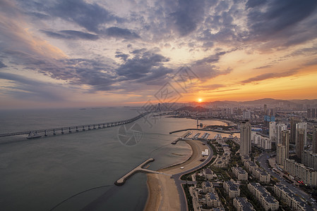 大连城市大连星海湾落日背景