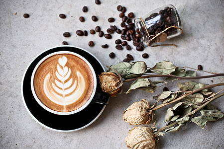 咖啡拉花与咖啡豆秋冬风格卡布奇诺咖啡背景
