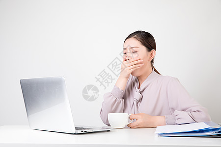 公司,辉煌犯困的商务女性背景