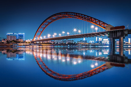 俯视城市夜景夜幕下的武汉晴川桥背景