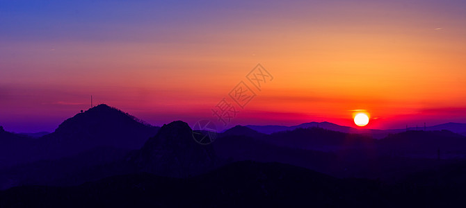 日落下的山峦群山背景图片