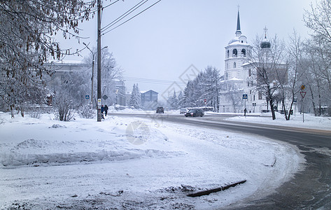 覆盖城市冬天城市雪景背景