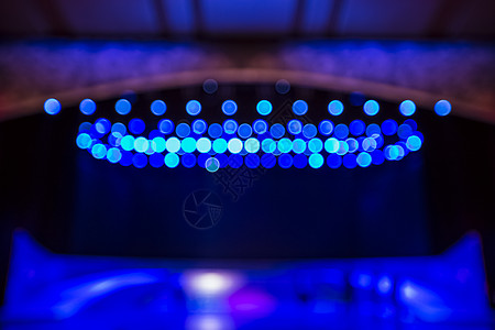 蓝色图形舞台的灯光背景