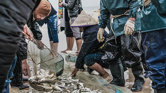 拉网捕鱼广西北海银滩渔民捕鱼背景