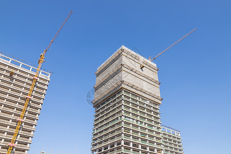 蓝天下建设的楼房背景图片