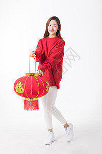 春节喜庆福字提着红灯笼的年轻女性背景
