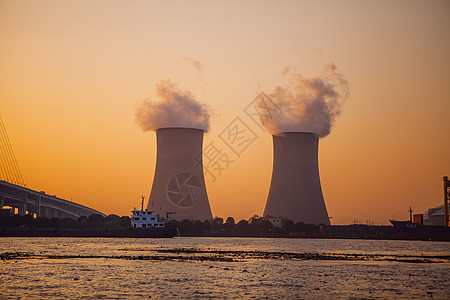 非化石能源夕阳下的烟囱背景