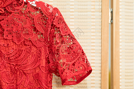 中国风女装红色旗袍特写背景