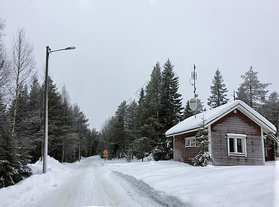 雪屋芬兰罗瓦涅米森林小木屋背景