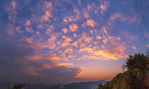 放射状夕阳彩霞背景图片