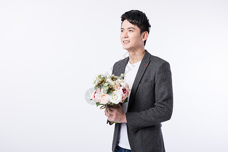 准备表白送花的帅气男生图片素材