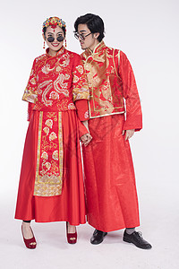 中式新郎新娘传统结婚的新郎新娘背景