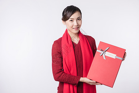 美丽女人节元素新春汉服美女手拿礼物背景