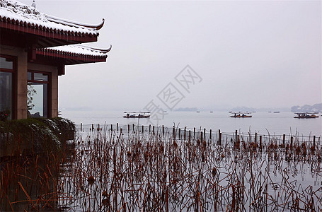 下雨下雪天的西湖图片