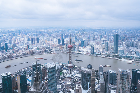 上海雨雪天气城市建筑全景背景图片