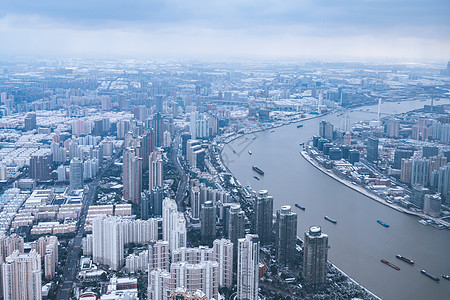 上海雨雪天气城市建筑全景背景图片