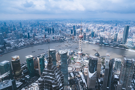 上海雨雪天气城市建筑全景背景图片