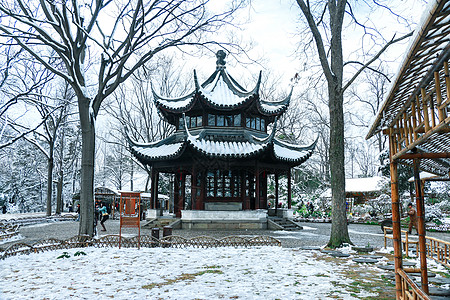 拙政园雪景图片