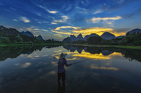 如诗如画梦境中的钓鱼人背景