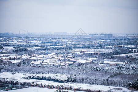 冬天城市南方城市雪景背景