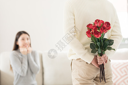 亲密情侣情人节男生送女生玫瑰花背景