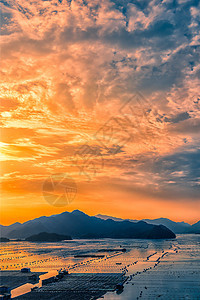 夕阳与海上渔村天空高清图片素材