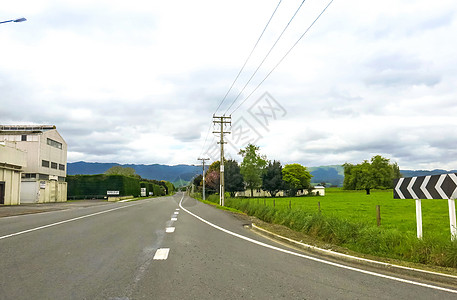 整洁曲线新西兰郊外公路背景