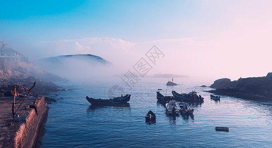 东极岛日出大雾背景图片