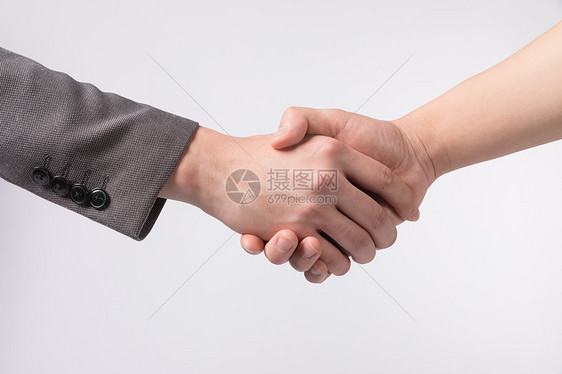 商务人士握手特写图片