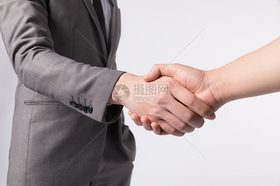 商务人士握手特写图片