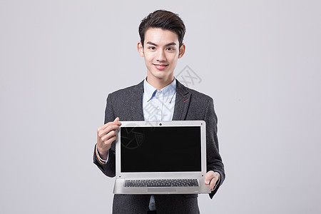 青年商务男性展示电脑图片