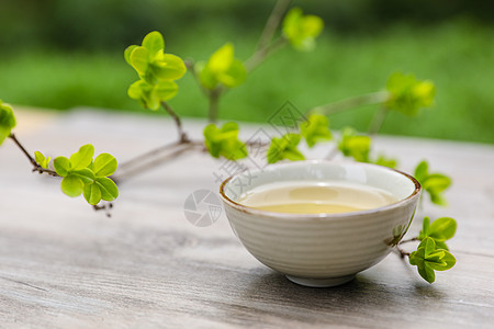 日式甜品树叶缠绕的香茗特写 小暑背景