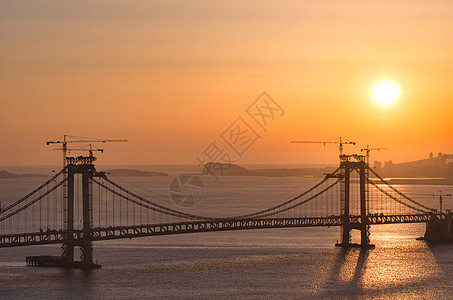 日落跨海大桥背景图片
