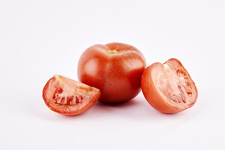 切开的番茄和完整的番茄背景图片