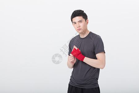 青年男性拳击健身男性护腕绑带背景