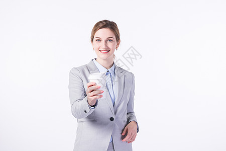喝咖啡的外国商务女性图片