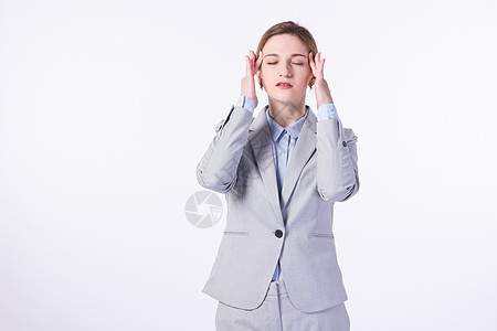 外国商务女性头痛图片