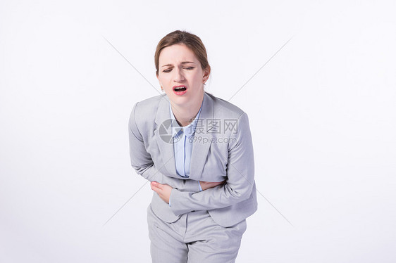 外国商务女性肚子痛图片