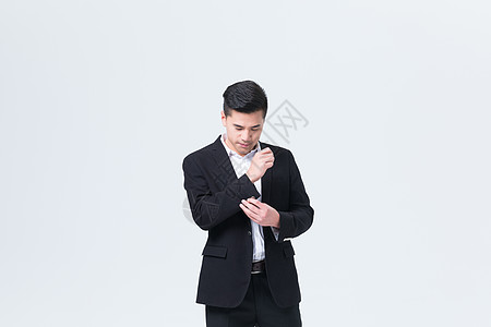 商务男性整理西装衬衣背景图片