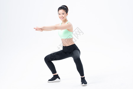 运动健身女性蹲马步图片素材