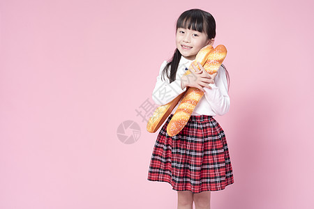 拿着面包的小女孩图片