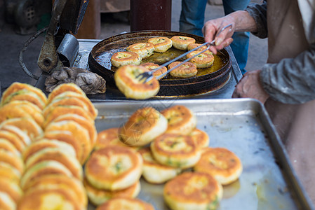 武大郎烧饼江苏靖江季市老街烧饼背景