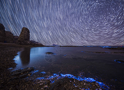 大连荧光海荧光海滩下的星轨背景