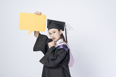 拿着文字框的毕业女学生图片