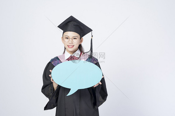 拿着文字框的毕业女学生图片